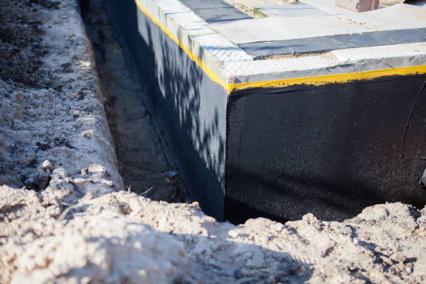 Professional Waterproofing technician working in Lima, OH